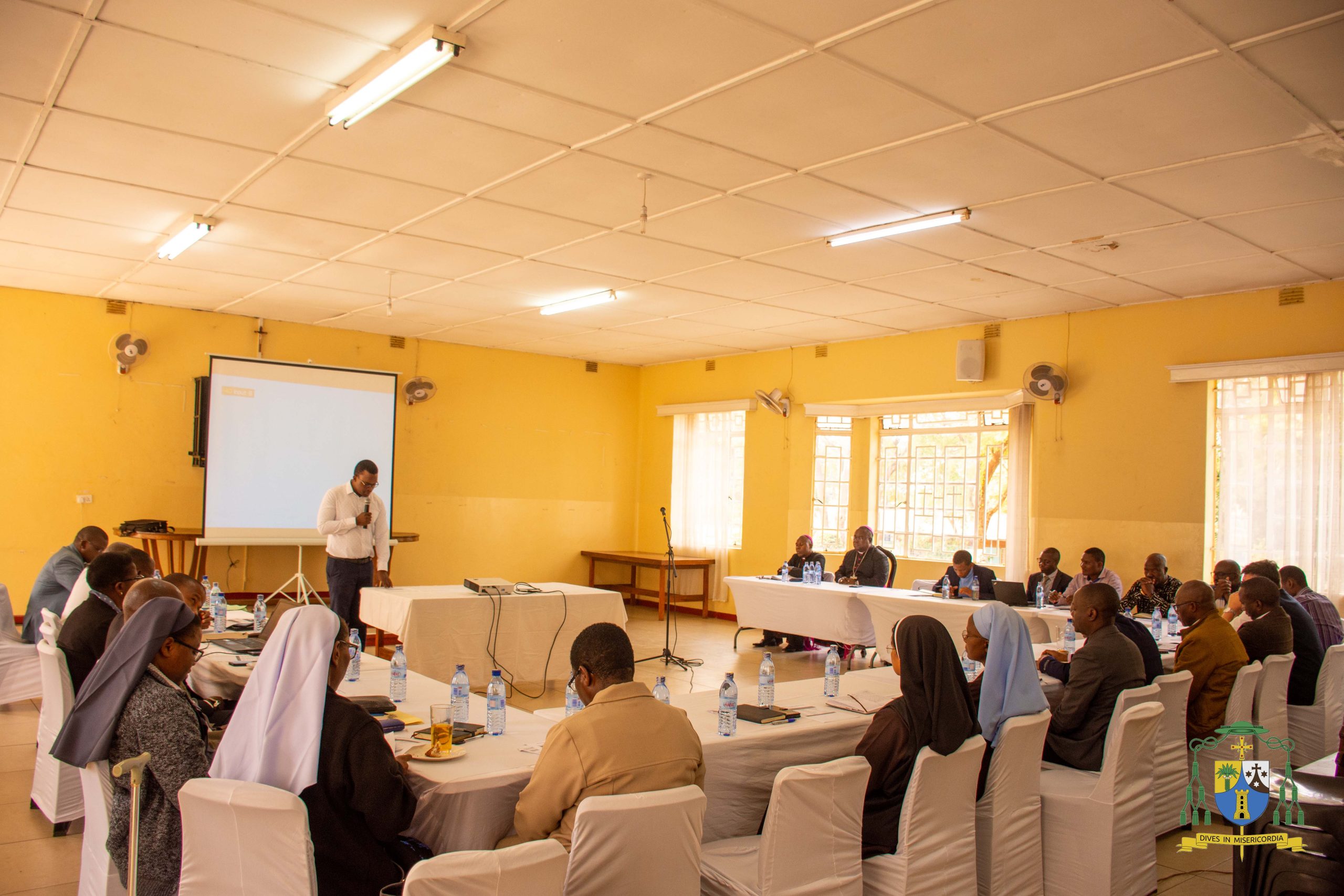 Meeting in progress at Maula Parish Hall