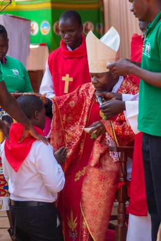  Bishop Vincent Mwakhwawa confirms a new missionary for Christ