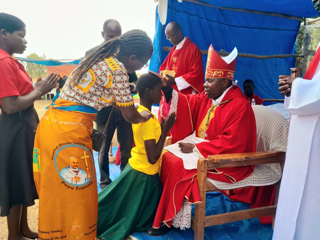 The second day for Bishop Mwakhwawa at Kafulama Zone, giving Sacrament of Confirmation to the adolescents
