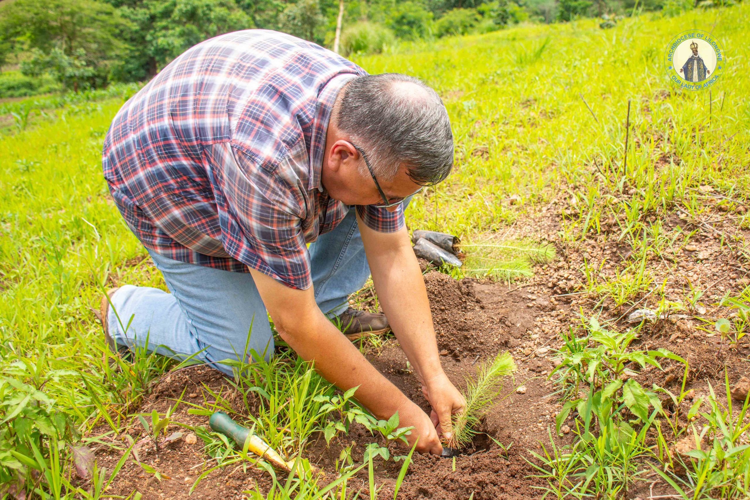 Parish Priest Fr. Francis Sebastian joins his congregation in the fields, fulfilling the call of Laudato Si’ to care for our common home